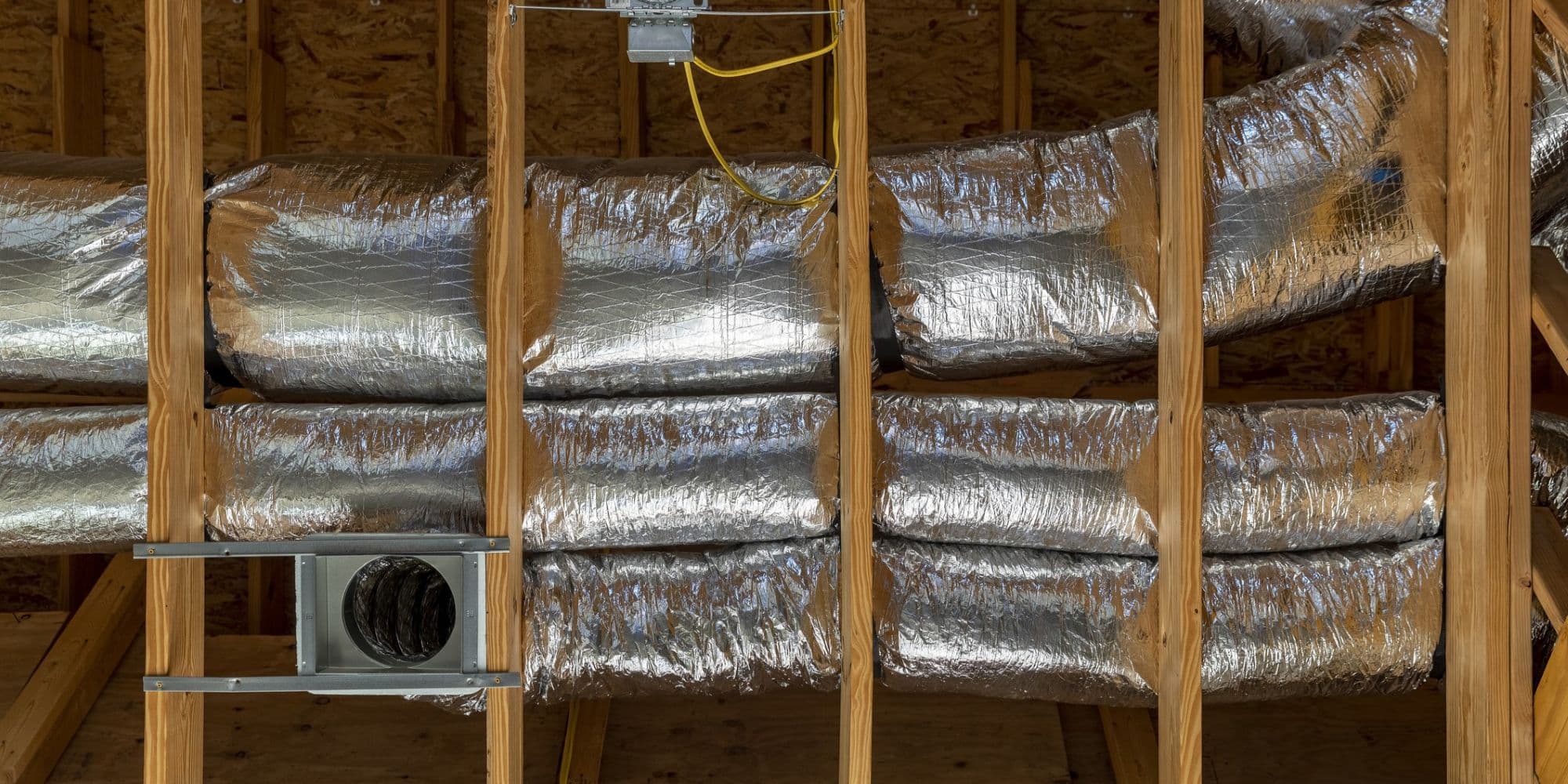 HVAC ductwork being installed.